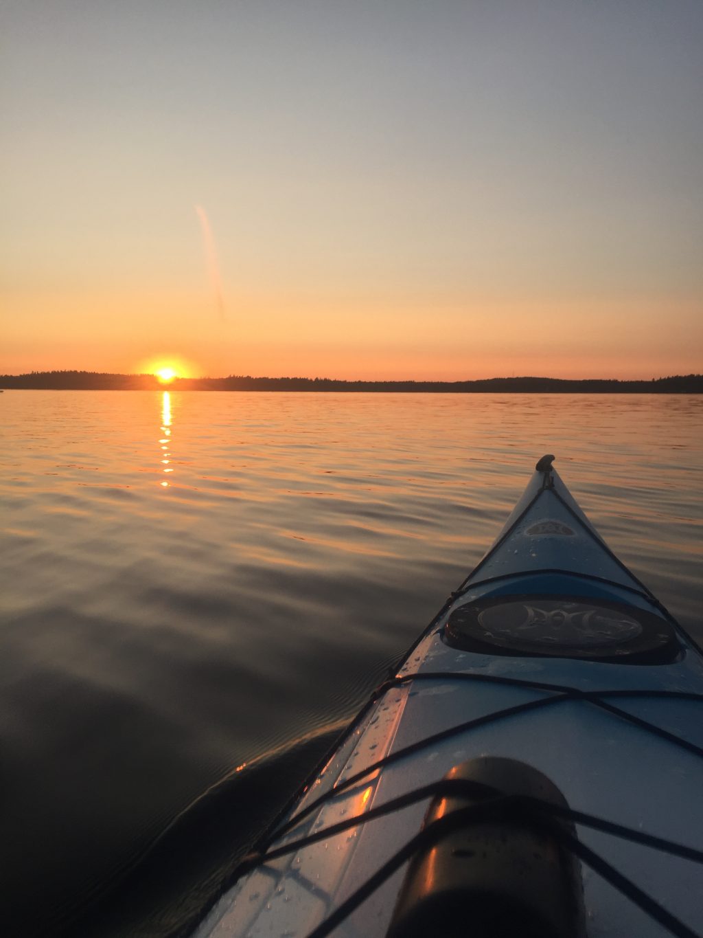 Canoeing at sunset.